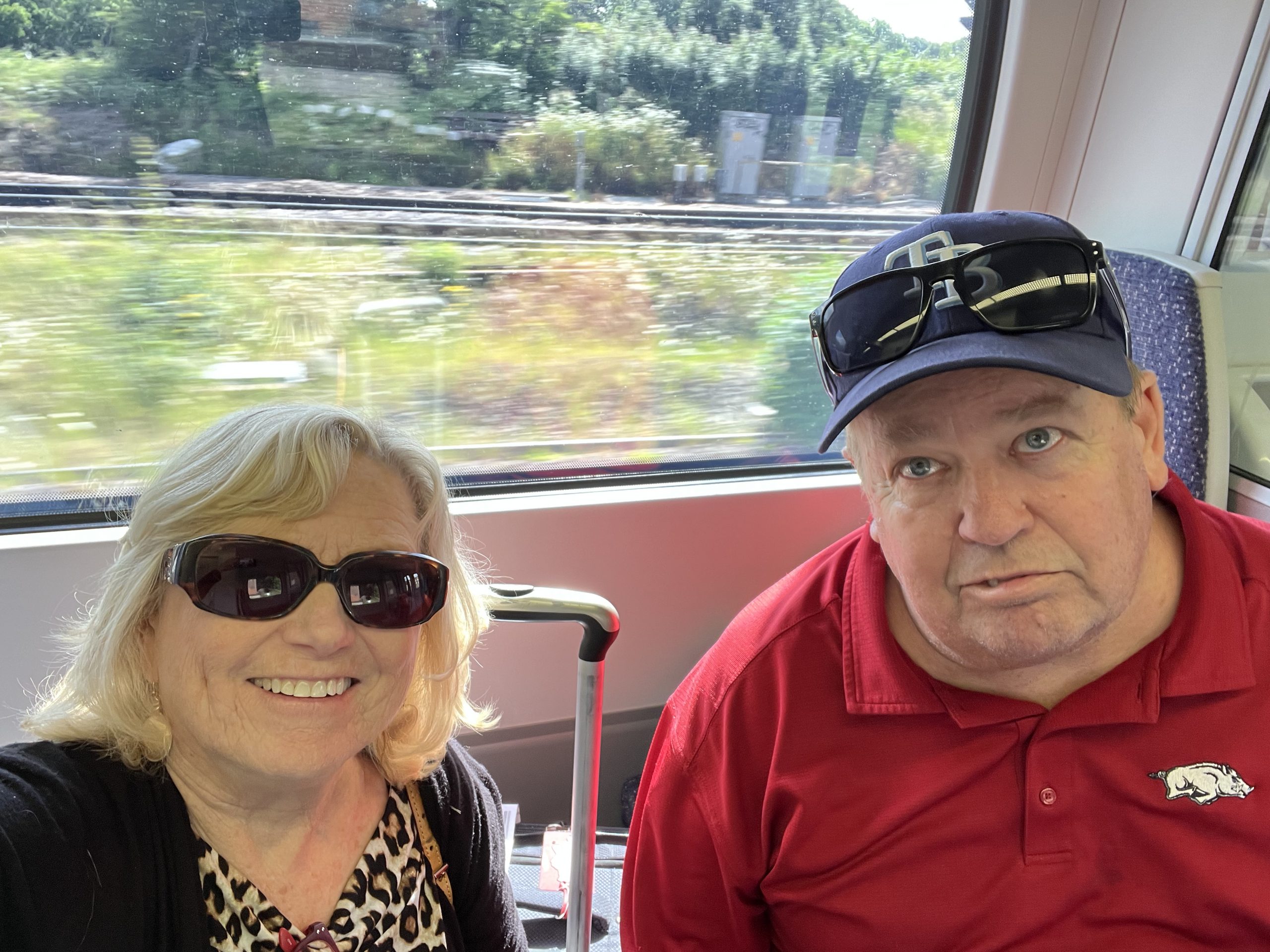 Kay and Kenny sitting on the train into London