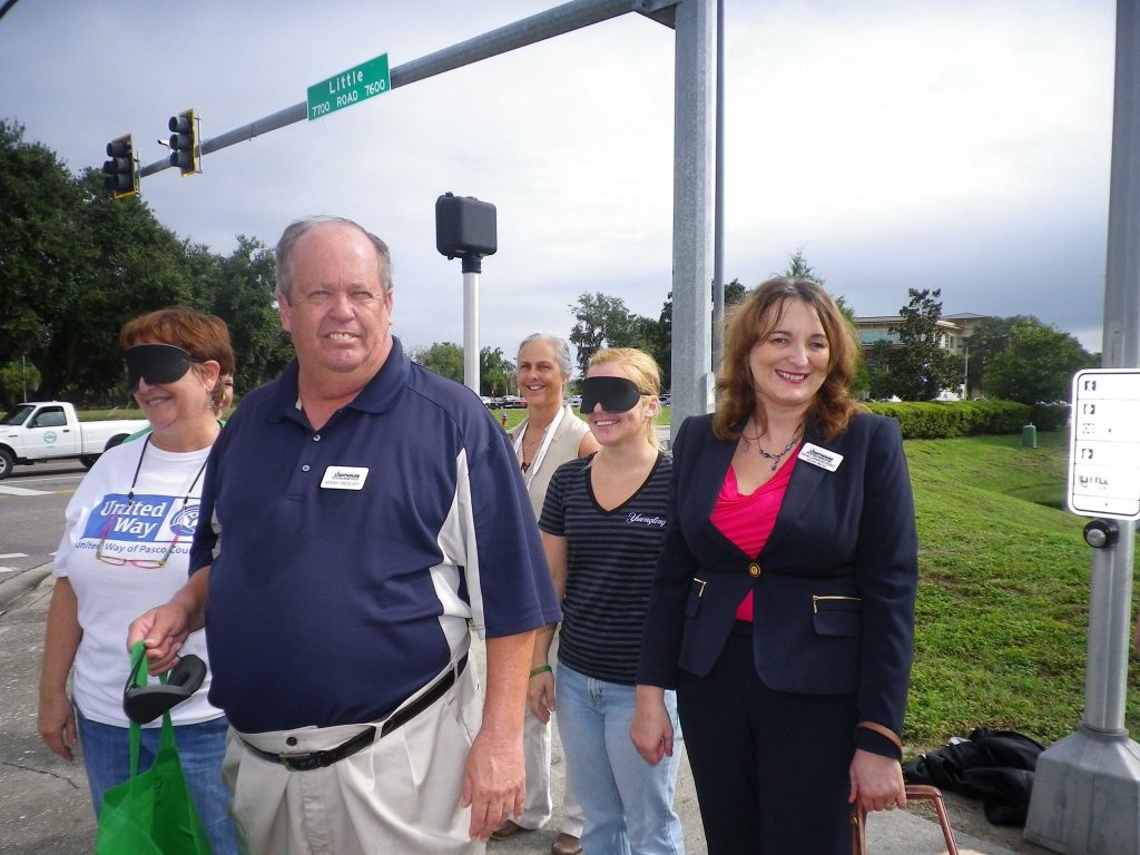 Kenny with a group participating with a group from the Lighthouse for the Visually Impaired and Blind for White Cane Day.